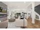 Open-concept living room flowing into the dining and kitchen areas at 2414 E 7Th St, Charlotte, NC 28204