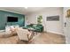 Well-lit living room with comfortable seating, contemporary design, and large windows at 2601 Ashley Rd, Charlotte, NC 28208