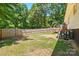Spacious, fenced backyard offering privacy and room to roam at 2903 Price Rushing Rd, Monroe, NC 28110