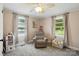 Bright bedroom with natural light and neutral paint and carpet at 2903 Price Rushing Rd, Monroe, NC 28110