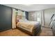 Comfortable bedroom with neutral carpet, natural light, and ample space at 2903 Price Rushing Rd, Monroe, NC 28110
