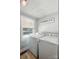 Functional laundry room with washer, dryer, and natural light at 2903 Price Rushing Rd, Monroe, NC 28110