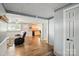 Open-concept living room with wood flooring and neutral paint at 2903 Price Rushing Rd, Monroe, NC 28110