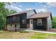 Rear exterior of a home showing the two-story siding, trimmed with copper gutters at 300 Dollar Cir, Charlotte, NC 28270
