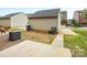 Backyard area with patio and minimal landscaping at 3039 Potomac River Pkwy, Charlotte, NC 28217