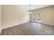 Bright dining area with light gray flooring and sliding glass doors at 3039 Potomac River Pkwy, Charlotte, NC 28217