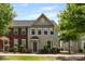 Charming townhome featuring well-maintained landscaping, a classic color scheme, and inviting curb appeal in a desirable neighborhood at 3039 Potomac River Pkwy, Charlotte, NC 28217