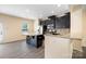 Contemporary kitchen with dark cabinets and granite countertops at 3039 Potomac River Pkwy, Charlotte, NC 28217
