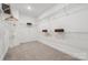 Spacious walk-in closet with ample shelving and hanging space for organized storage at 3058 Tramore Dr, Harrisburg, NC 28075