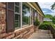 Charming brick home with shuttered windows and manicured landscape, providing classic curb appeal at 3424 Autumn Dr, Gastonia, NC 28056
