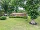 Charming single-story home with well-maintained lawn, mature trees, and inviting front exterior at 3424 Autumn Dr, Gastonia, NC 28056