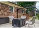View of patio with gazebo, table with four chairs and a wooden bar with seating at 3424 Autumn Dr, Gastonia, NC 28056