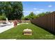 Beautiful backyard featuring manicured lawn and outdoor game area at 4021 Redwood Ave, Charlotte, NC 28205