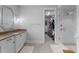 Elegant bathroom with walk-in shower, walk-in closet, and stylish vanity at 4021 Redwood Ave, Charlotte, NC 28205
