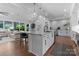 Modern open kitchen with a center island and views to the connected living room at 4021 Redwood Ave, Charlotte, NC 28205