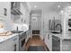 Bright kitchen features stainless steel appliances, granite counters, and island sink at 4021 Redwood Ave, Charlotte, NC 28205