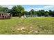 Sprawling backyard featuring a pool, deck, and a well-manicured lawn at 403 Kings Dr, Cherryville, NC 28021