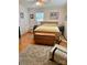 Comfortable bedroom with hardwood floors, ceiling fan, and sunny windows at 403 Kings Dr, Cherryville, NC 28021