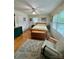 Bright bedroom with hardwood floors, two windows, and neutral decor at 403 Kings Dr, Cherryville, NC 28021