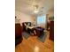 This bedroom has hardwood floors, ceiling fan, natural light, and a cozy feel at 403 Kings Dr, Cherryville, NC 28021