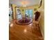 Sunlit dining area featuring hardwood floors, a chandelier, and access to the backyard at 403 Kings Dr, Cherryville, NC 28021