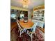 Bright dining room featuring hardwood floors, a chandelier, and a charming hutch at 403 Kings Dr, Cherryville, NC 28021