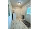 The front foyer boasts marble tile, and a side door plus the front door let in ample natural light at 403 Kings Dr, Cherryville, NC 28021