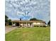 Charming single-story home with a welcoming carport, brick accents, and beautifully maintained lawn at 403 Kings Dr, Cherryville, NC 28021