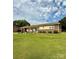 Inviting one-story home featuring a well-kept lawn, brick accents, and a cozy covered porch at 403 Kings Dr, Cherryville, NC 28021