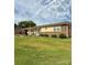 Well-kept single-story home with brick accents and a nicely landscaped front yard at 403 Kings Dr, Cherryville, NC 28021