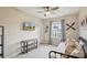 Comfortable bedroom featuring a daybed, soft bedding, natural light and ceiling fan at 4430 Bravery Sw Pl, Concord, NC 28027
