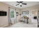 Bright bedroom featuring a modern desk setup, natural light, and neutral wall paint at 4430 Bravery Sw Pl, Concord, NC 28027