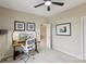 This home office features a computer desk and neutral walls, creating a clean workspace at 4430 Bravery Sw Pl, Concord, NC 28027