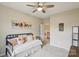 Comfortable bedroom with modern daybed, neutral colors and lots of light at 4430 Bravery Sw Pl, Concord, NC 28027