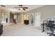 Second floor bonus room with natural light and neutral tones at 4430 Bravery Sw Pl, Concord, NC 28027