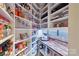 Well-organized pantry with ample shelving, countertop, and clear storage containers at 4430 Bravery Sw Pl, Concord, NC 28027