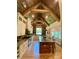 Gourmet kitchen with a large island, a wood beam vaulted ceiling, and modern appliances at 5016 Carolina North Dr, Gastonia, NC 28056