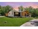 Charming single-Gathering home with green lawn, modern accents and neutral paint, set in a serene, wooded landscape at 5033 Waxhaw Indian Trail Rd, Matthews, NC 28104