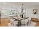 Bright, spacious kitchen with a large island, modern appliances, and adjacent dining area at 5033 Waxhaw Indian Trail Rd, Matthews, NC 28104