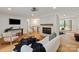 Bright living room featuring modern furnishings and hardwood flooring at 5033 Waxhaw Indian Trail Rd, Matthews, NC 28104