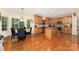 View of the kitchen with stainless steel appliances, a large island, and a breakfast nook for casual dining at 530 Shady Oaks Dr, Stanley, NC 28164