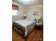 Bedroom features hardwood floors, double bed, window, and two end tables with lamps at 536 Catalina Dr, Albemarle, NC 28001