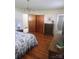 Spacious bedroom featuring hardwood floors, closet space and classic dresser at 536 Catalina Dr, Albemarle, NC 28001