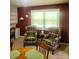 Charming breakfast nook with plaid chairs, natural light, and traditional decor at 536 Catalina Dr, Albemarle, NC 28001