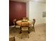 Classic dining room with hardwood table set, comfortable seating and brick accents at 536 Catalina Dr, Albemarle, NC 28001
