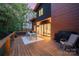 Outdoor deck with dining area and modern grill, perfect for entertaining and relaxation at 5925 Creola Rd, Charlotte, NC 28270