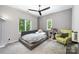 Cozy bedroom with a platform bed, soft lighting, and views to the outdoors at 5925 Creola Rd, Charlotte, NC 28270