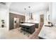 Bright, modern kitchen featuring an island with seating, stainless steel appliances, and sleek cabinetry at 5925 Creola Rd, Charlotte, NC 28270