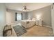 Charming bedroom with ceiling fan, natural light, and neutral decor at 5927 Quail Hollow Rd # H, Charlotte, NC 28210