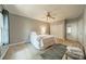 Charming bedroom with ceiling fan, natural light, and neutral decor at 5927 Quail Hollow Rd # H, Charlotte, NC 28210